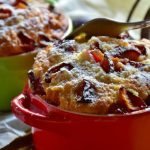 Individual Bread Puddings in a Red and a Green Dish.